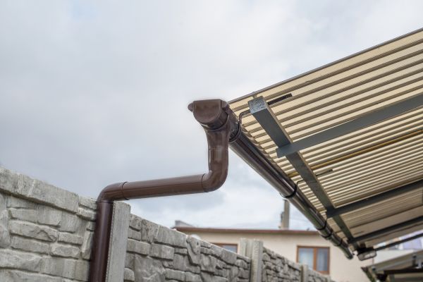 Plastic Downspout Installation in Huntersville